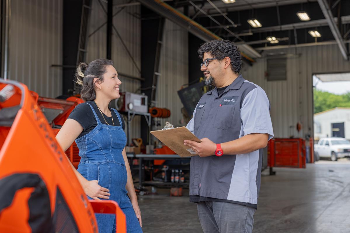 Kubota service tech and customer