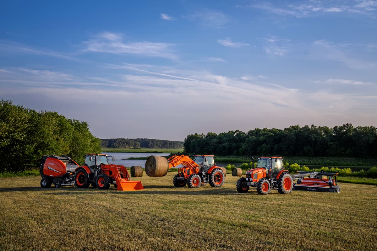Kubota utility tractor lineup with hay tools